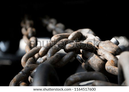 Rusty chain. Background. 
Lock the chain. Tensioned chain