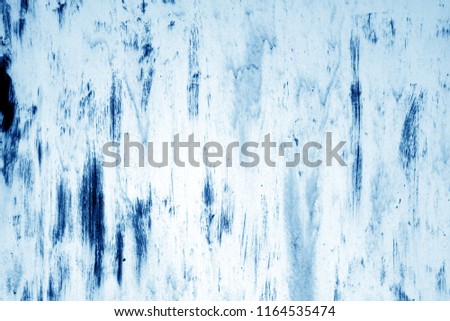 Grungy rusted metal surface in navy blue tone. Abstract background and texture.