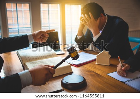 Businessman feels stressed when filed for bankruptcy, bankruptcy and execution concept. Royalty-Free Stock Photo #1164555811