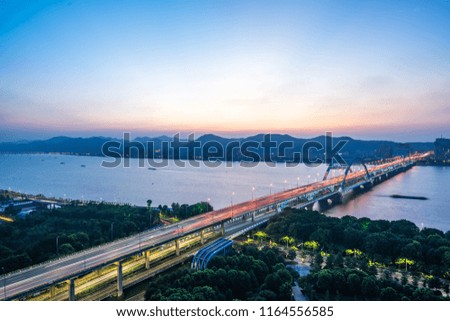 busy traffic road with city skyline in hangzhou china