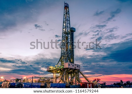 Onshore land rig in oil and gas industry.  Royalty-Free Stock Photo #1164579244