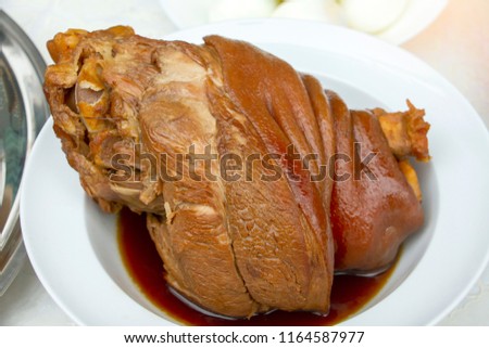 Stewed pork leg or boiled pork leg the one of the favourite food for Chinese food. Chinese ghost festival day food for ancestor passed away warship.   Royalty-Free Stock Photo #1164587977