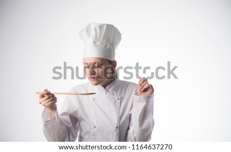 girl cook trying food
