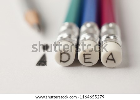 Pencil on white paper, creative and idea concept