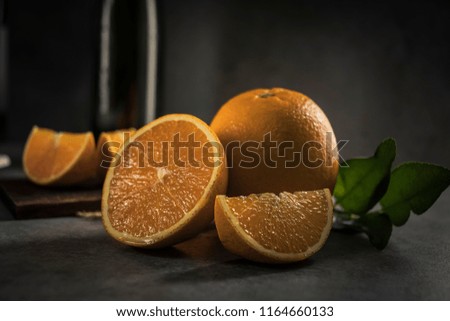 Beautiful, fresh orange on the dark background. Healthy sweet food concept. Mock up for fruits offers as advertising or web background, or other ideas. Empty place for text or logo.