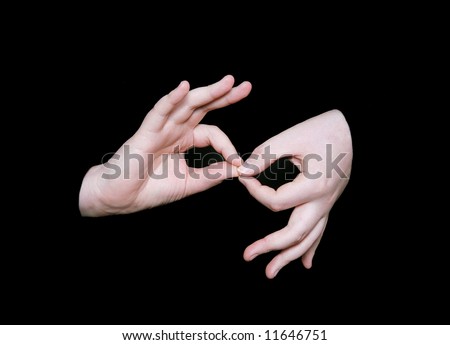 the interpreting sign in sign language on a black background