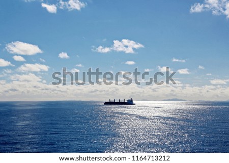 Seascapes. Various kinds of colorful blue sky, sun, clouds and open spaces of the world ocean. View from the side of a sea ship while moving and in the port at anchor.