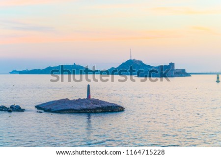 Sunset view of Frioul island and Chateau d'if in Marseille, France
