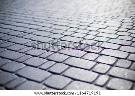 Paving stones. Concept of laying paving slabs and pavers. Paving stones. Concrete pavement blocks