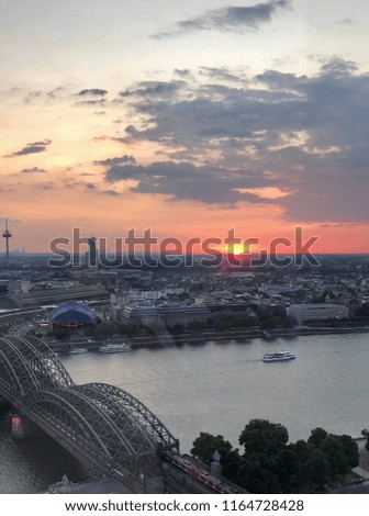 Sunset in Cologne, Germany, viewed from the   Kölntriangle building of the city. Views to the Rhine river.