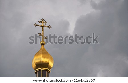 Church dome with a cross.