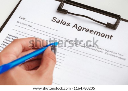 contract form, selling and buying home or condo concept