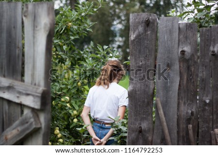 girl walking in the garden