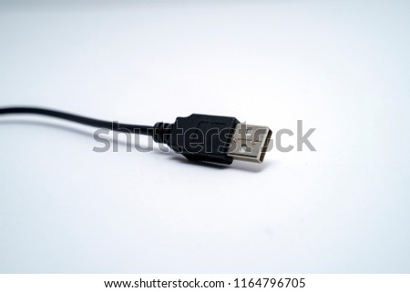 Black USB Cable on White Background