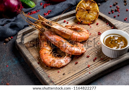 Tiger prawns on the grill Royalty-Free Stock Photo #1164822277