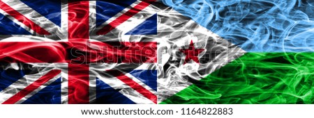 United Kingdom vs Djibouti smoke flags placed side by side. Thick colored silky smoke flags of Great Britain and Djibouti