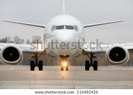 Closeup view of an aircraft preparing to take off Royalty-Free Stock Photo #116482426