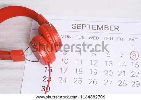 Calendar with headphones. Musical september calendar. Music and Organization management concept.