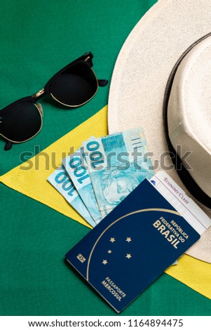 Brazilian Passport on Brazilian flag background
