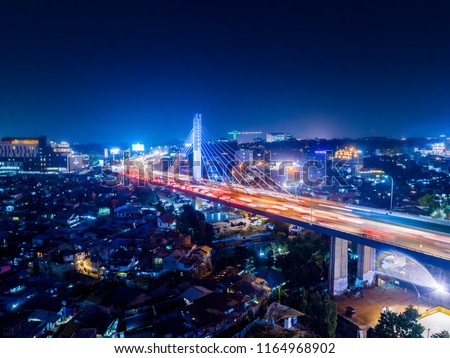 Aerial Night View of Pasupati Cable Stayed / Suspension Bridge, the Longest Flyover and one icon of Bandung, West Java, Indonesia, Asia Royalty-Free Stock Photo #1164968902