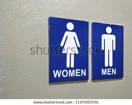 toilet signs indicate for entrance to male and female