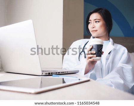 Portrait of Young Asian woman doctor in the hospital.