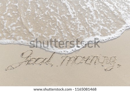 The sea with waves hit the sandy beach in the good morning, with copy space writing 