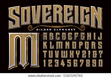 An ornate, regal, gilded alphabet that exudes elegance and drama. Royalty-Free Stock Photo #1165145761