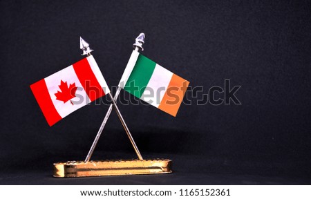 Canada and Ireland table flag with black Background