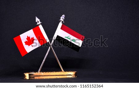 Canada and Iraq table flag with black Background