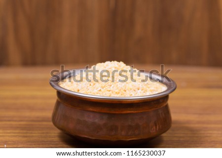 indian seeds dalhiya isolated on wood background