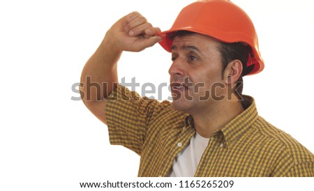 Close up of a handsome Hispanic mature male constructionist builder wearing hardhat looking shocked isolated emotional expressive disaster shocking surprised anxious confused. Royalty-Free Stock Photo #1165265209