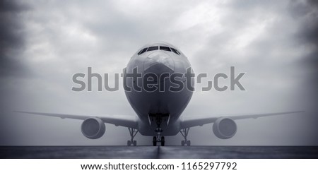 Airplane in fog, front view. Dense fog at the airport. Fog and airplane. Royalty-Free Stock Photo #1165297792