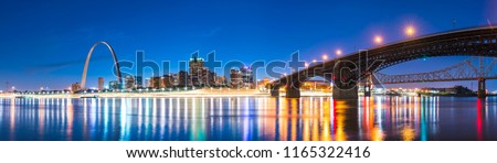 st. louis skyscraper at night with reflection in river,st. louis,missouri,usa. Royalty-Free Stock Photo #1165322416