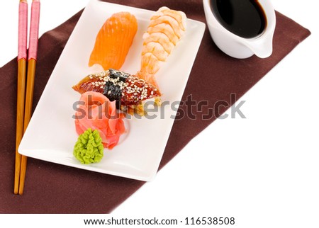 delicious sushi served on plate isolated on white