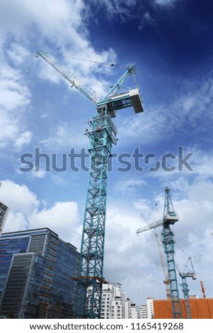 House under construction. Industrial skyline. Construction of new high-rise buildin in the city