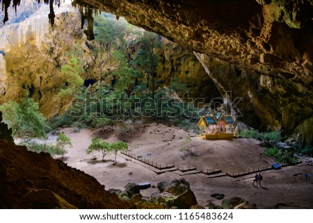The famous cave with temple in Thailand. This picture are include some traveler