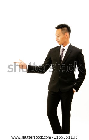 Asian business man standing and right hand poniting action Isolated on white backgrounds