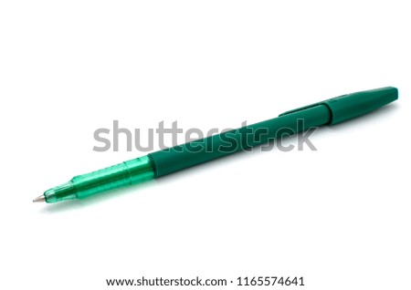 green pen on a white background