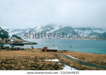 Norway, Scandinavia. Single house in Norwegian mountains. Typical overcas Landscape photography. Green and brown color in nature.