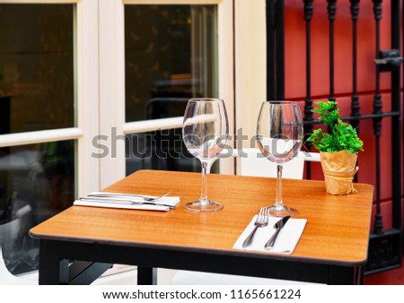 Outdoor restaurant patio on the street of Malaga. Andalusia. Spain