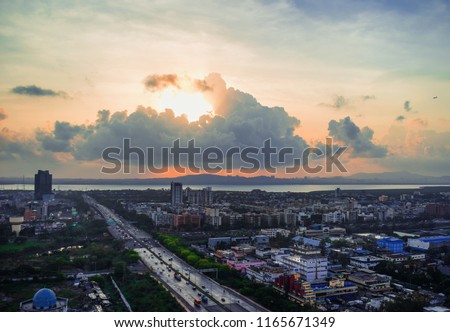 Skyline of Navi Mumbai showing the areas of Vashi and the Vashi creek captured during sunset. Captured this picture during the monsoons of 2018. 