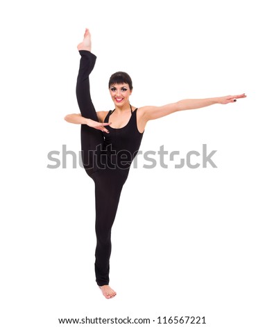 Young smiling acrobat posing against isolated white background