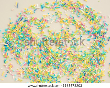 Colorful sugar sprinkles used for delicious dessert. 