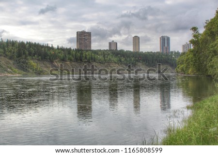 Buildings Reflection In Water