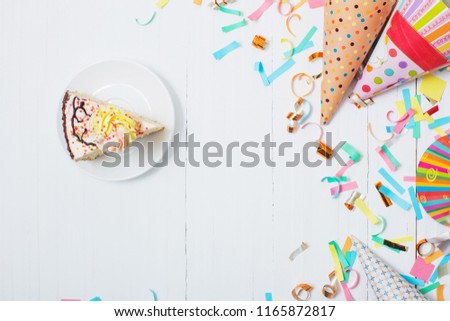 birthday cake and  decoration on white wooden background