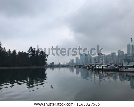 Stanley Park seawall and downtown Vancouver view, Vancouver, BC, Canada