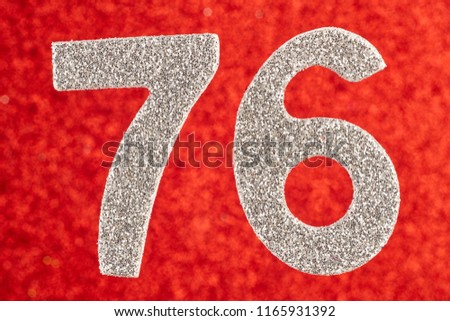 Number seventy-six silver color over a red background. Anniversary. Horizontal