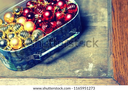 small red ball in a box