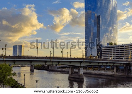 Philadelphia city skyline at sunset across Schuylkill river